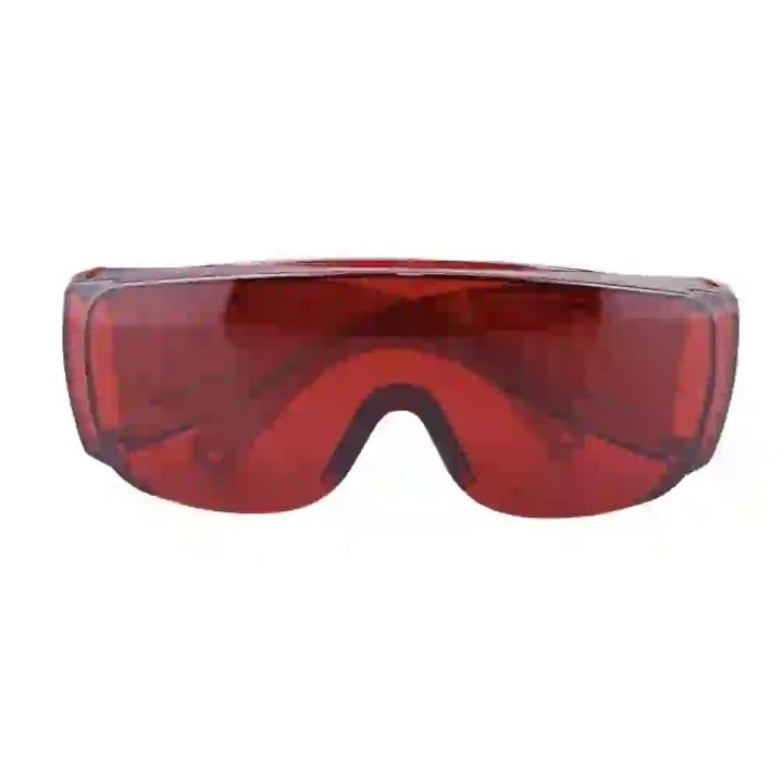 Schutzbrille für das Anbringen von Zahnschmuck