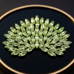 Aile papillon peridot 2x4 mm