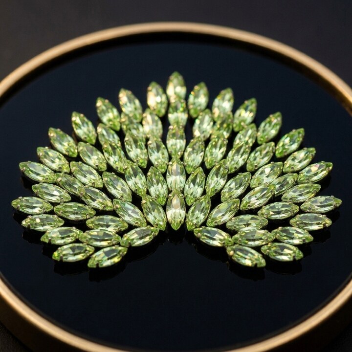 Aile papillon peridot 2x4 mm